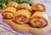 Листкові рулетики з сардельками і сиром